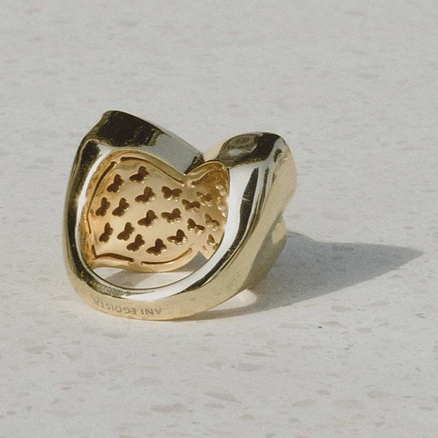 ANI EGOISTA gold-plated Metamorphosis ring with abstract butterfly design, representing elegance and transformation